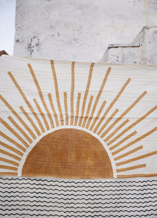 Powered By People Rising Sun Linen Throw