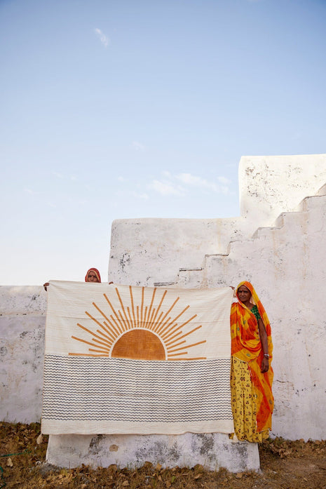 Powered By People Rising Sun Linen Throw